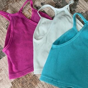 Set of Three Ribbed Tank Tops in Pink, Teal, and Cream free people xs/s